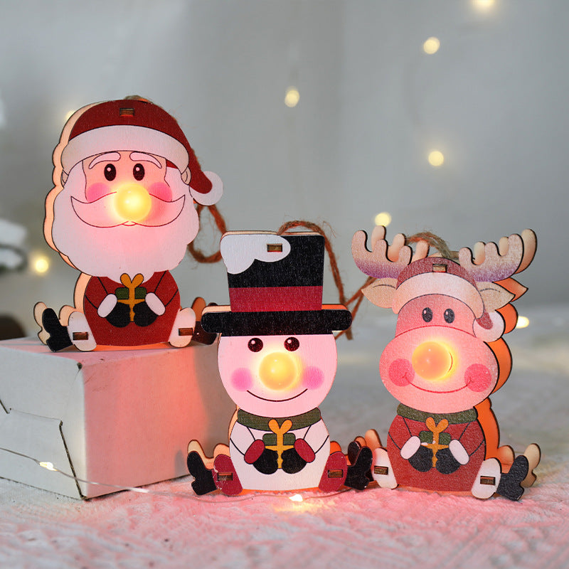 Weihnachtsdekoration Leuchtende Ornamente aus Holz